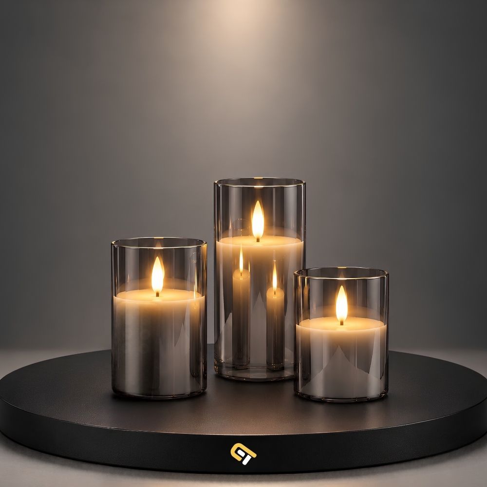 Glass flameless LED candle set in smoky grey glass on black display