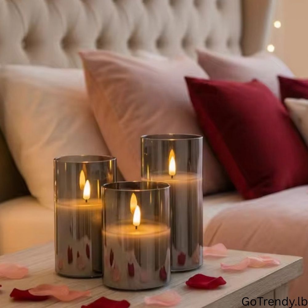 Glass flameless LED candle set creating a warm bedroom atmosphere